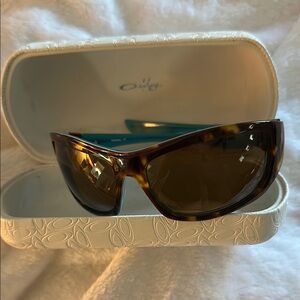 Oakley Tortoiseshell Sunglasses with torquoise blue  Accents